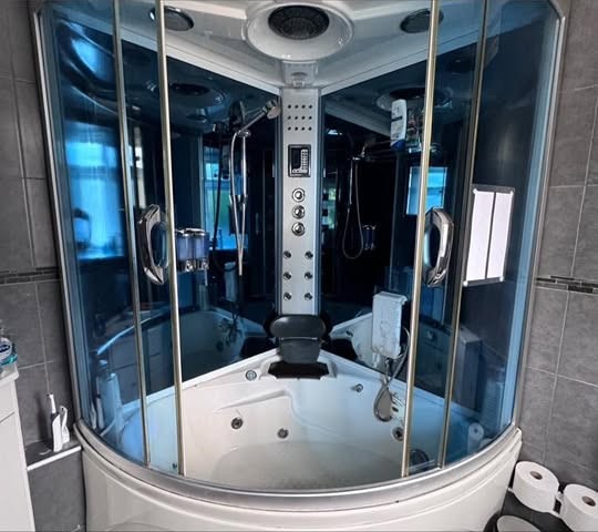 Original photograph of the shower after cleaning