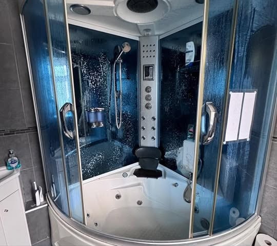 Original photograph of the shower before cleaning